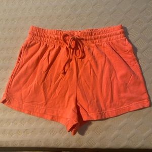 Out from under coral shorts